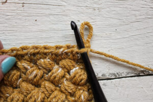 Mustard Puff Crochet Infinity Scarf Pattern - The Knotted Nest