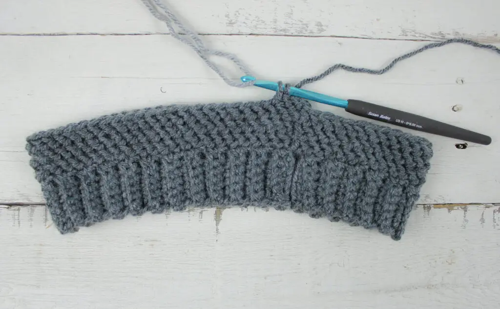 Stop with two loops on hook and pull through with new color