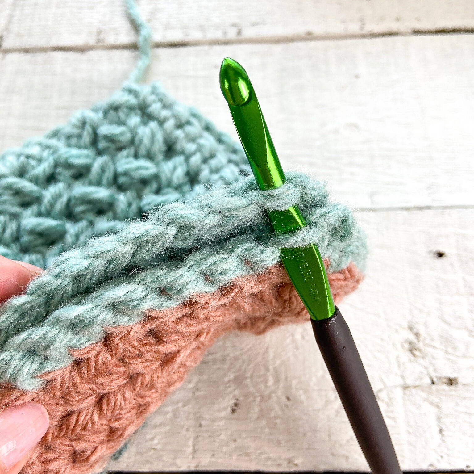 Slip stitch through both squares to join