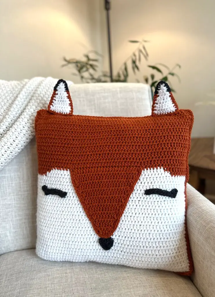 Forest animal fox pillow on a chair