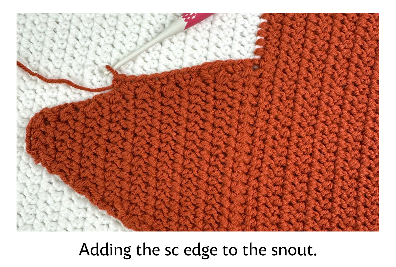 crocheting around the fox snout for the front of the pillow